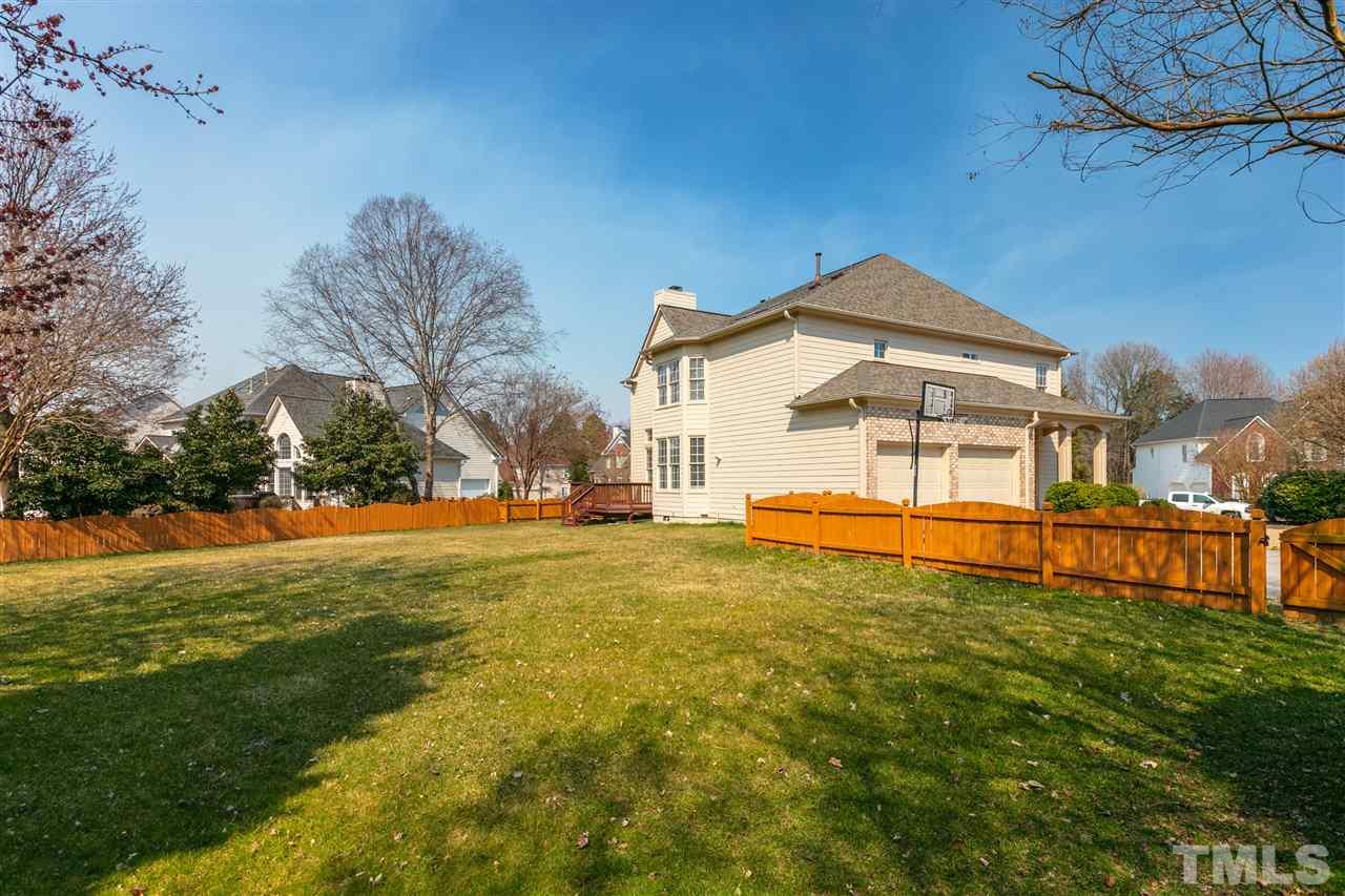106 Ecklin Lane Cary, NC 27519 - Photo 25 of 29 a front view of a house with a yard