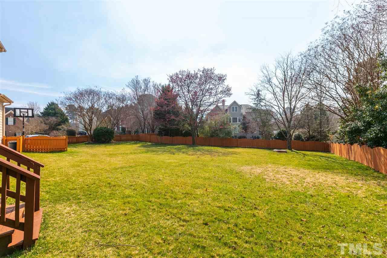 106 Ecklin Lane Cary, NC 27519 - Photo 27 of 29 a view of swimming pool and trees in the background