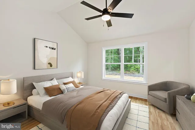 a bedroom with bed and window