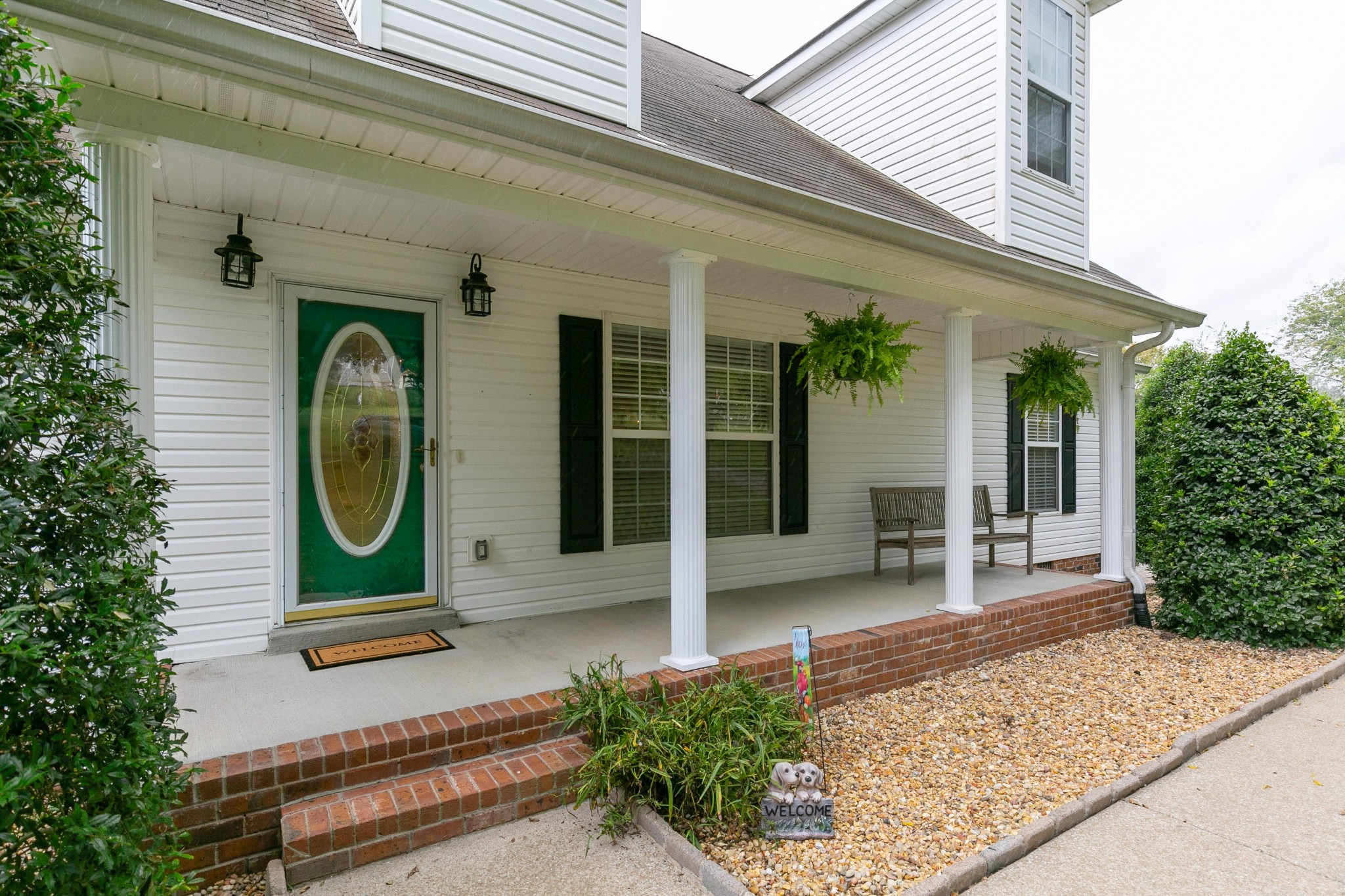 19 B Vantrease Road Brush Creek, TN 38547 - Photo 3 of 41 front view of a house with a garden
