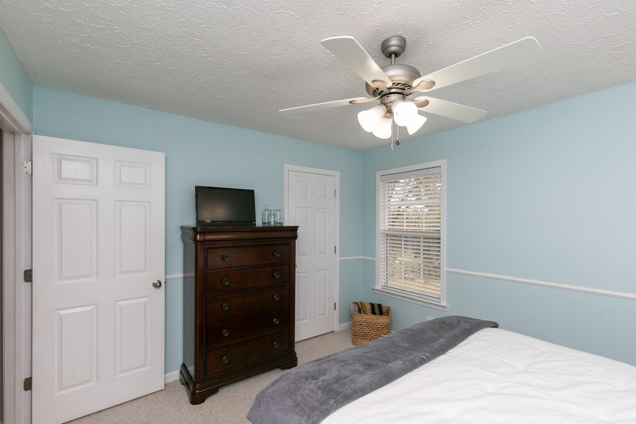 19 B Vantrease Road Brush Creek, TN 38547 - Photo 24 of 41 a bedroom with a bed and a television