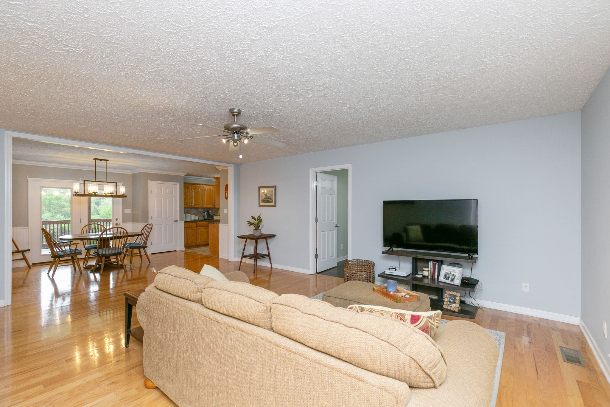 19 B Vantrease Road Brush Creek, TN 38547 - Photo 4 of 41 a living room with furniture and a flat screen tv