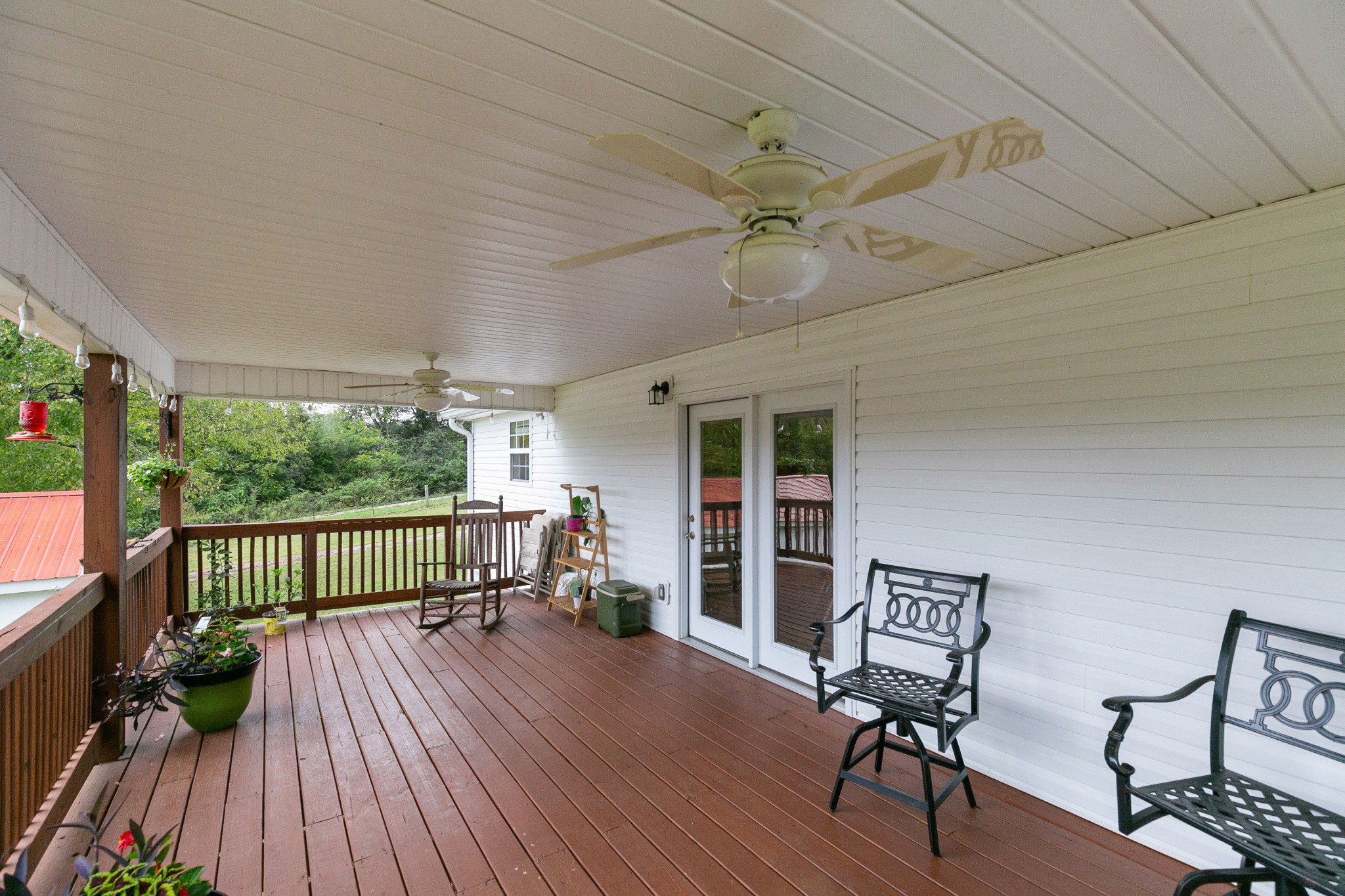 19 B Vantrease Road Brush Creek, TN 38547 - Photo 32 of 41 a view of a porch with furniture and a yard
