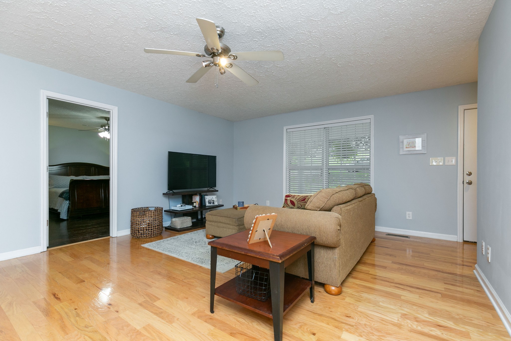 19 B Vantrease Road Brush Creek, TN 38547 - Photo 5 of 41 a living room with furniture and a flat screen tv