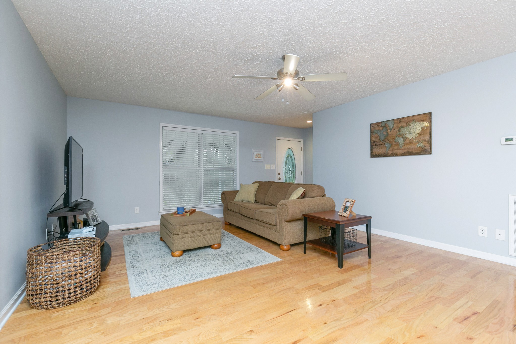 19 B Vantrease Road Brush Creek, TN 38547 - Photo 6 of 41 a living room with furniture and a flat screen tv
