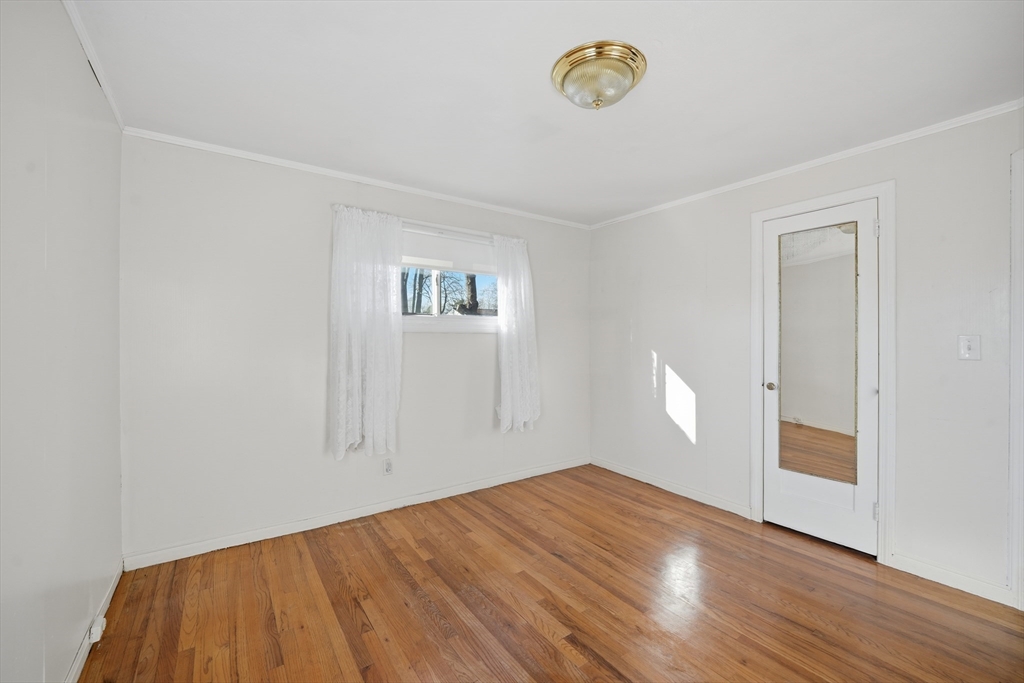 744 Bradley Road Springfield, MA 01109 - Photo 16 of 24 a view of empty room with wooden floor