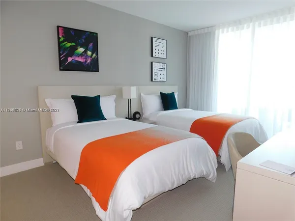 a utility room with a sink a washer and dryer