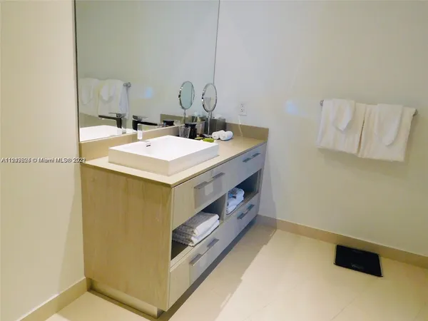 a workspace with furniture and window