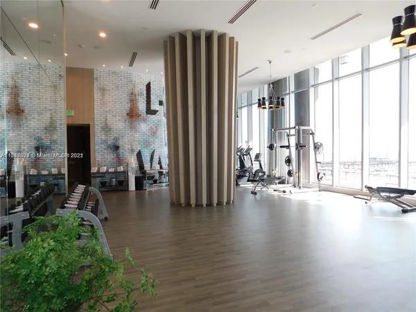 a view of a room with gym equipment