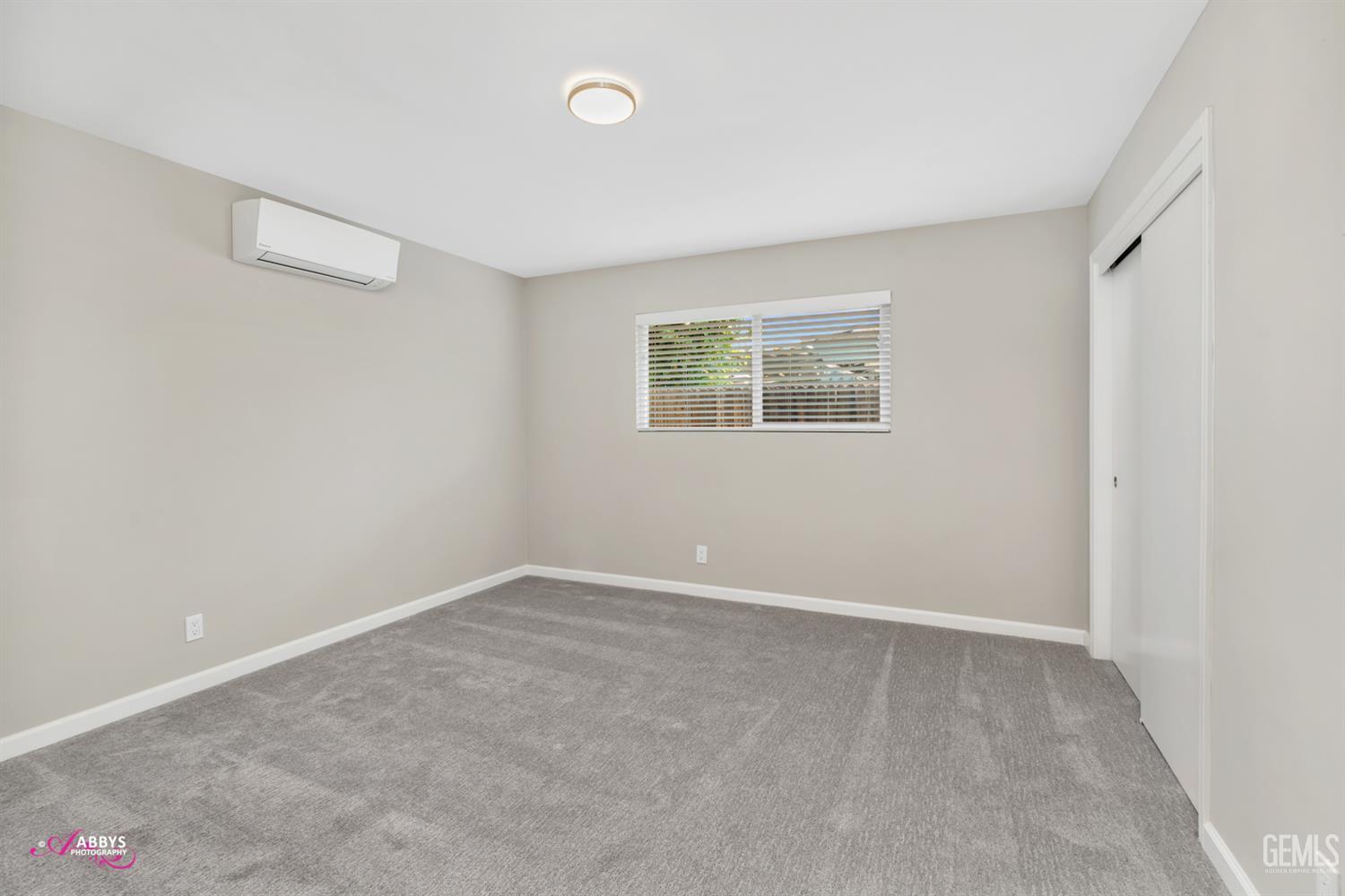 Undisclosed Address Bakersfield, CA 93309 - Photo 13 of 22 an empty room with windows