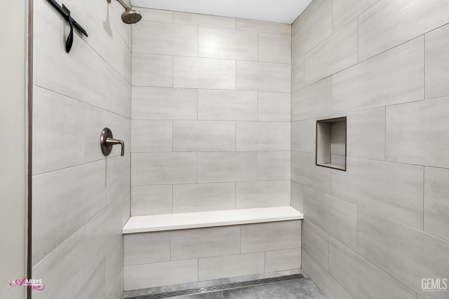 Undisclosed Address Bakersfield, CA 93309 - Photo 16 of 22 a bathroom with a shower and bathtub