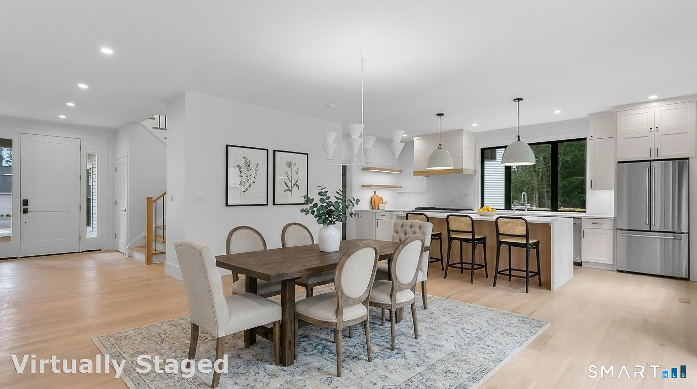 80 Oronoque Hills Road Stratford, CT 06614 - Photo 4 of 31 a view of a dining room with furniture