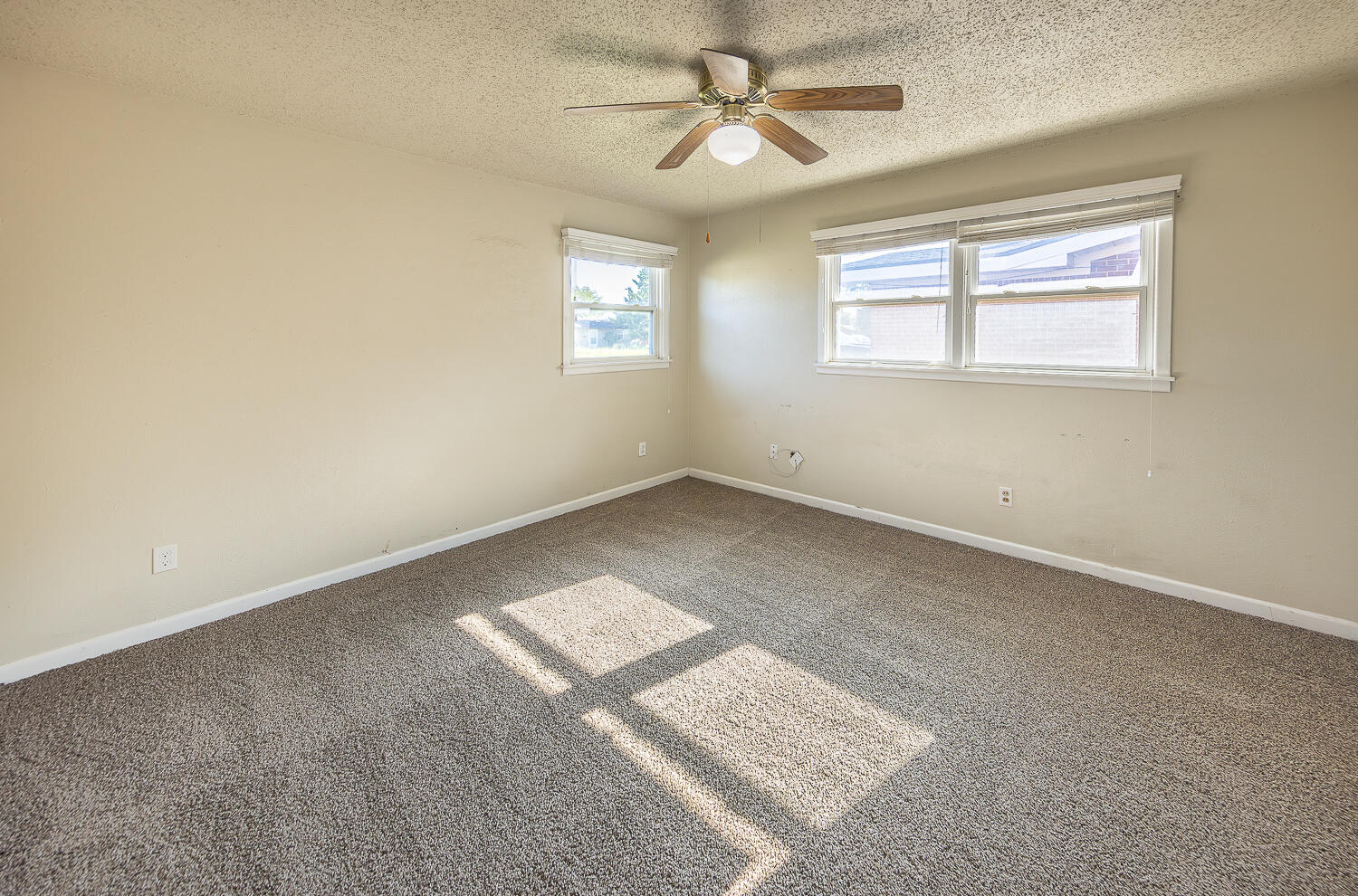 5017 46th Street Lubbock, TX 79414 - Photo 15 of 24 a view of an empty room with a window