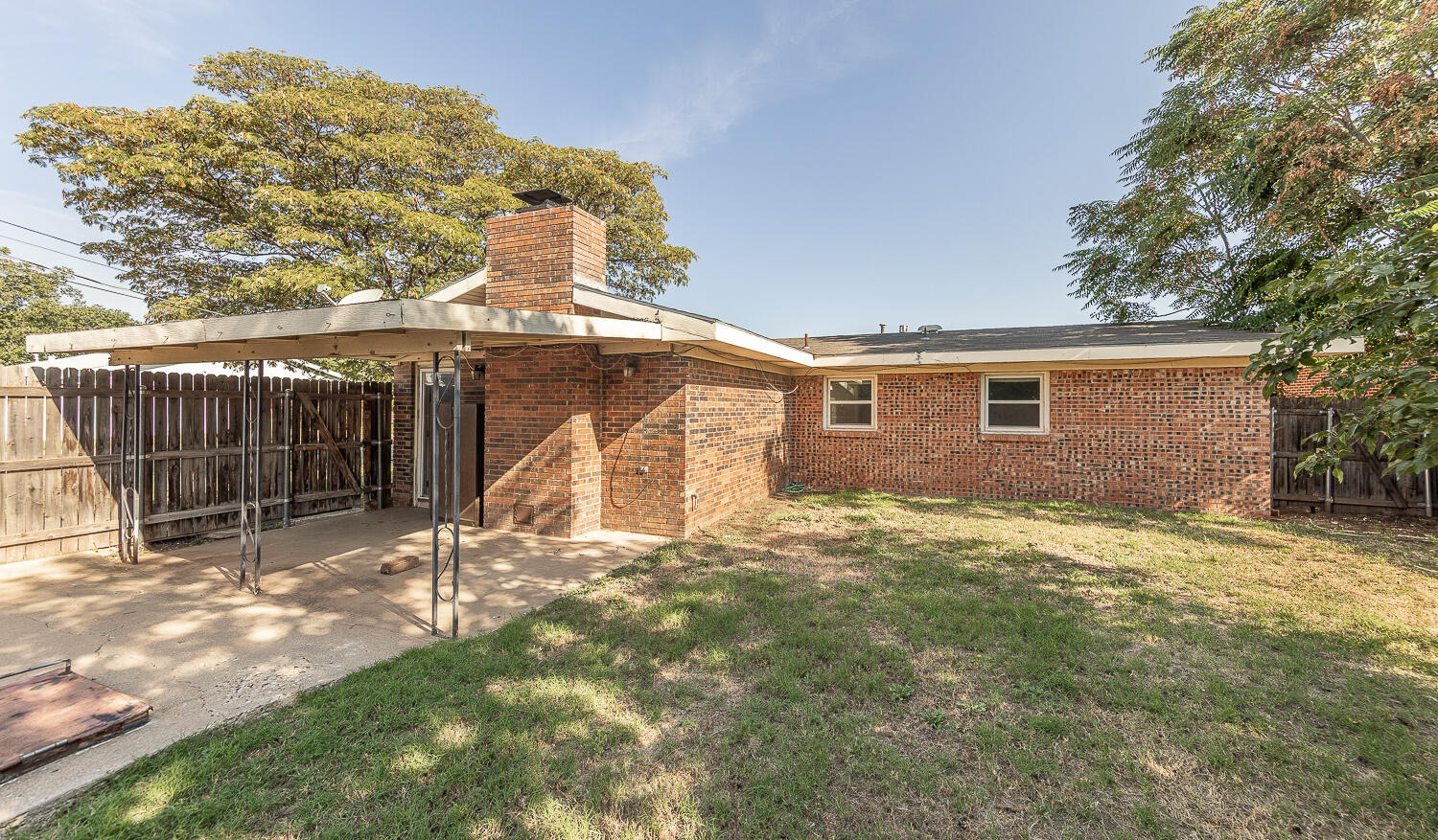 5017 46th Street Lubbock, TX 79414 - Photo 21 of 24 a view of a house with a yard