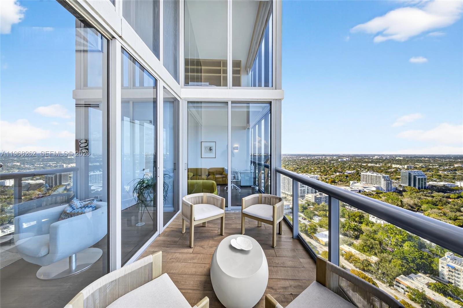 601 Northeast 36th Street, Unit 3407 Miami, FL 33137 - Photo 12 of 41 a view of roof deck with furniture