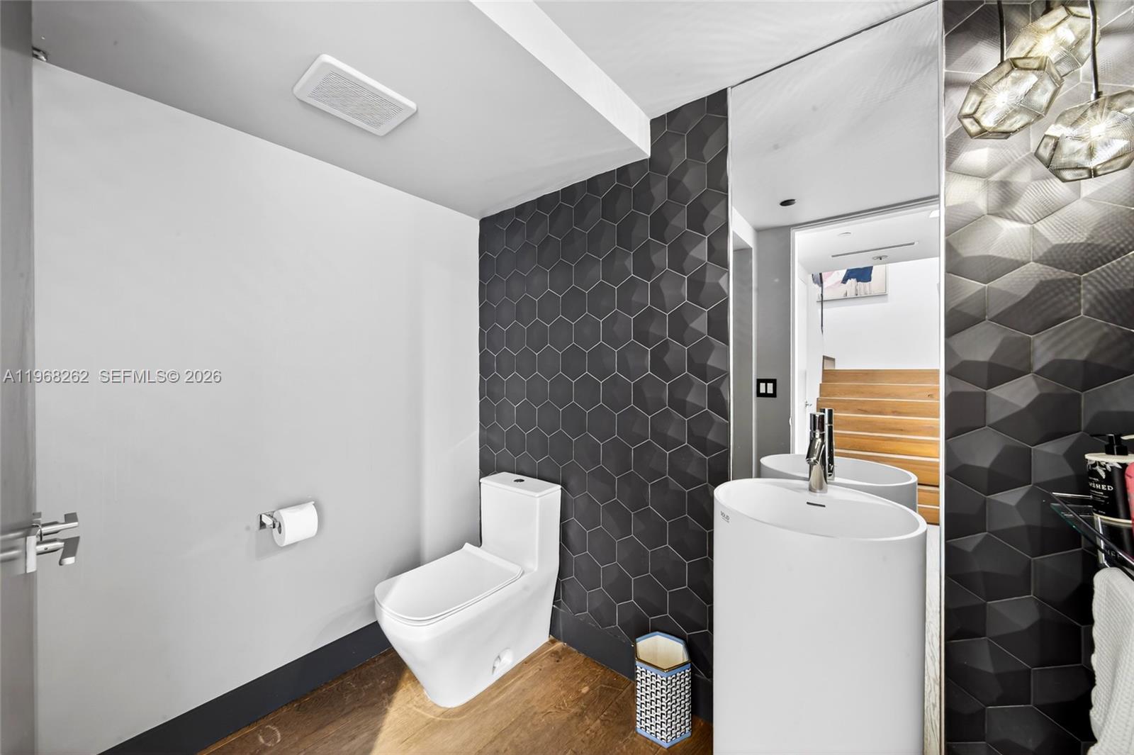 601 Northeast 36th Street, Unit 3407 Miami, FL 33137 - Photo 15 of 41 a bathroom with a sink toilet and shower