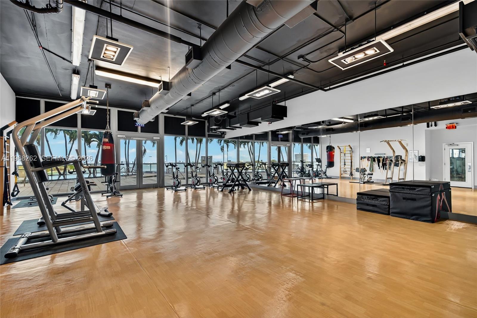 601 Northeast 36th Street, Unit 3407 Miami, FL 33137 - Photo 35 of 41 a view of a swimming pool with a patio