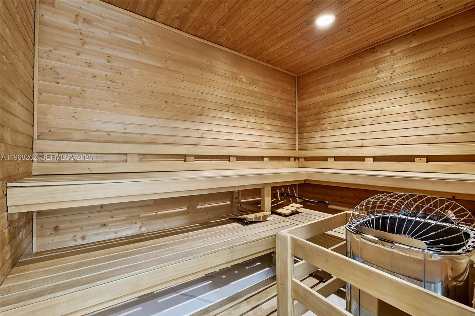 601 Northeast 36th Street, Unit 3407 Miami, FL 33137 - Photo 36 of 41 a view of a room with racks on the wall