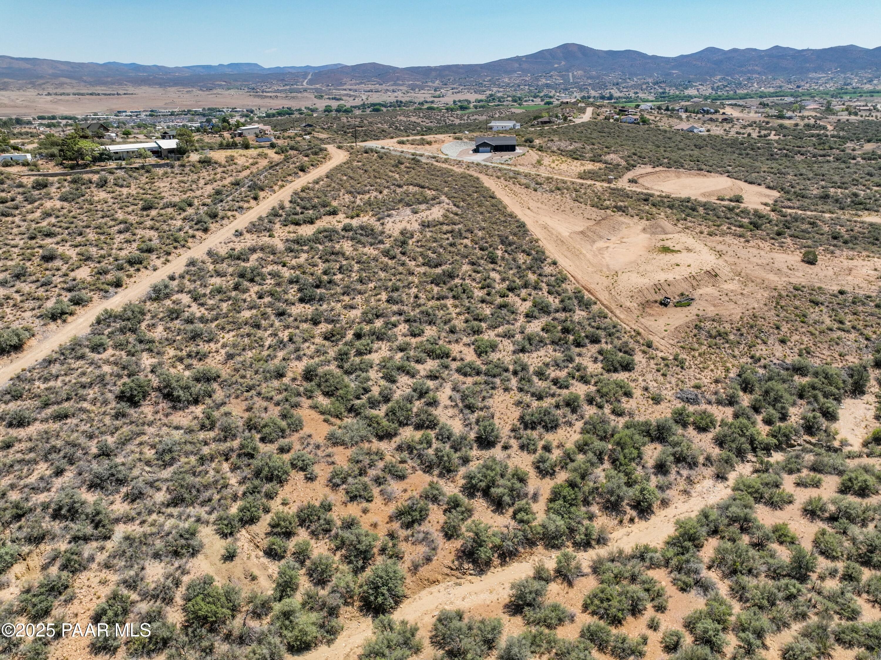 1285 South Stumps Road Dewey-Humboldt, AZ 86327 - Photo 20 of 21 a view of a city with mountains in the background