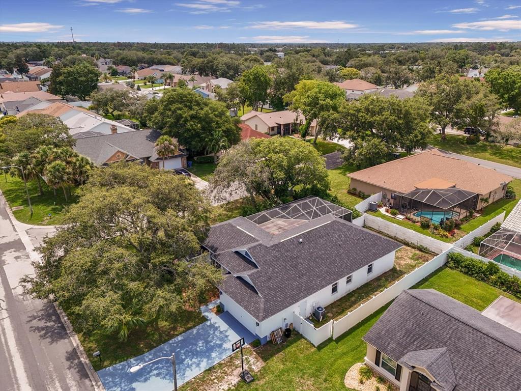 7282 Aloe Drive Spring Hill, FL 34607 - Photo 24 of 25 an aerial view of a house with a garden
