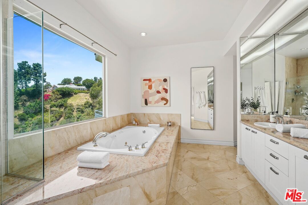 1991 Stradella Road Los Angeles, CA 90077 - Photo 16 of 26 a very nice looking room with a large window
