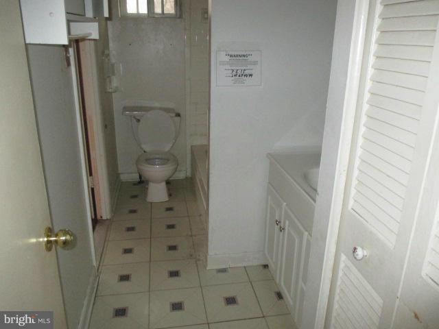 8800 Sigrid Road Randallstown, MD 21133 - Photo 7 of 16 a bathroom with a granite countertop shower