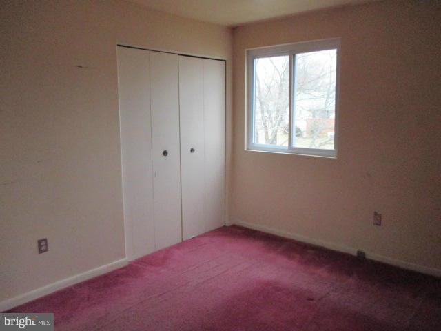 8800 Sigrid Road Randallstown, MD 21133 - Photo 8 of 16 an empty room with windows