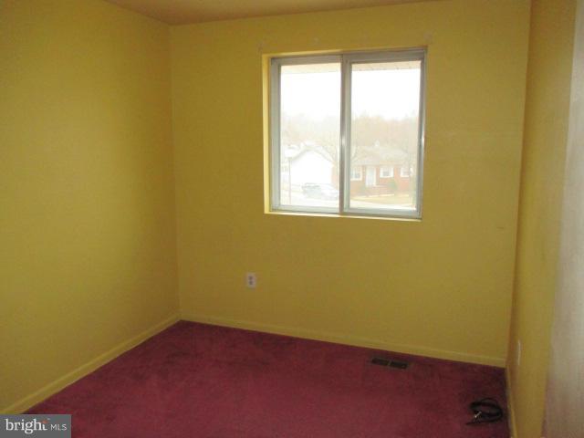 8800 Sigrid Road Randallstown, MD 21133 - Photo 9 of 16 an empty room with a window
