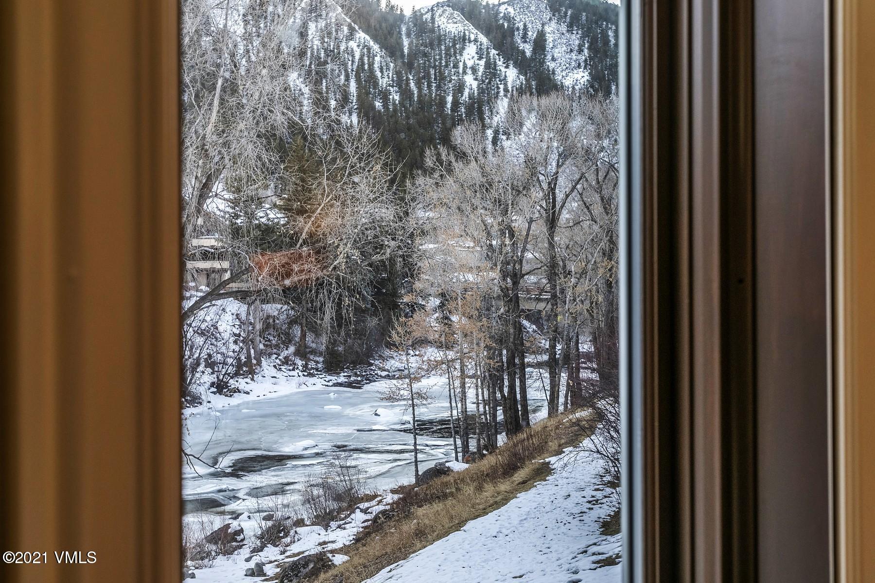 3000 Eaglebend Drive, Unit 1 Avon, CO 81620 - Photo 25 of 41 a view of a yard from a balcony
