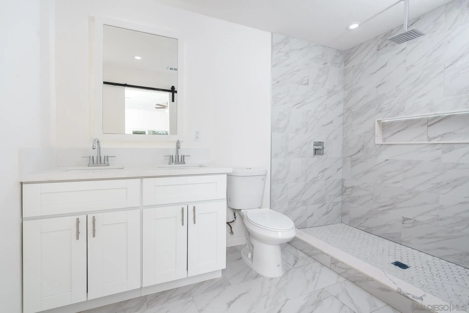 9208 Brookside Circle Spring Valley, CA 91977 - Photo 16 of 31 a bathroom with a sink a toilet and shower