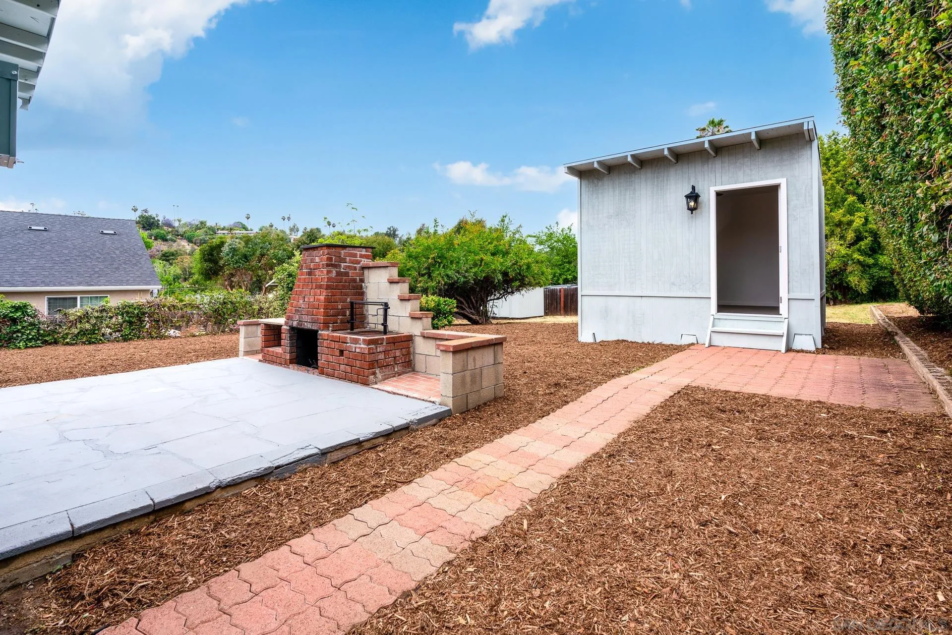 9208 Brookside Circle Spring Valley, CA 91977 - Photo 2 of 31 a house with yard and a garden