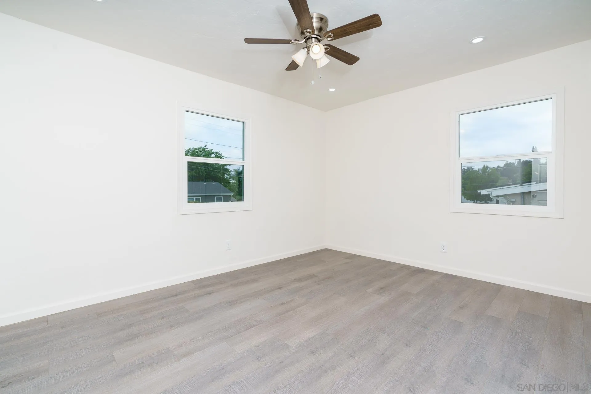 9208 Brookside Circle Spring Valley, CA 91977 - Photo 24 of 31 an empty room with a window and a ceiling fan