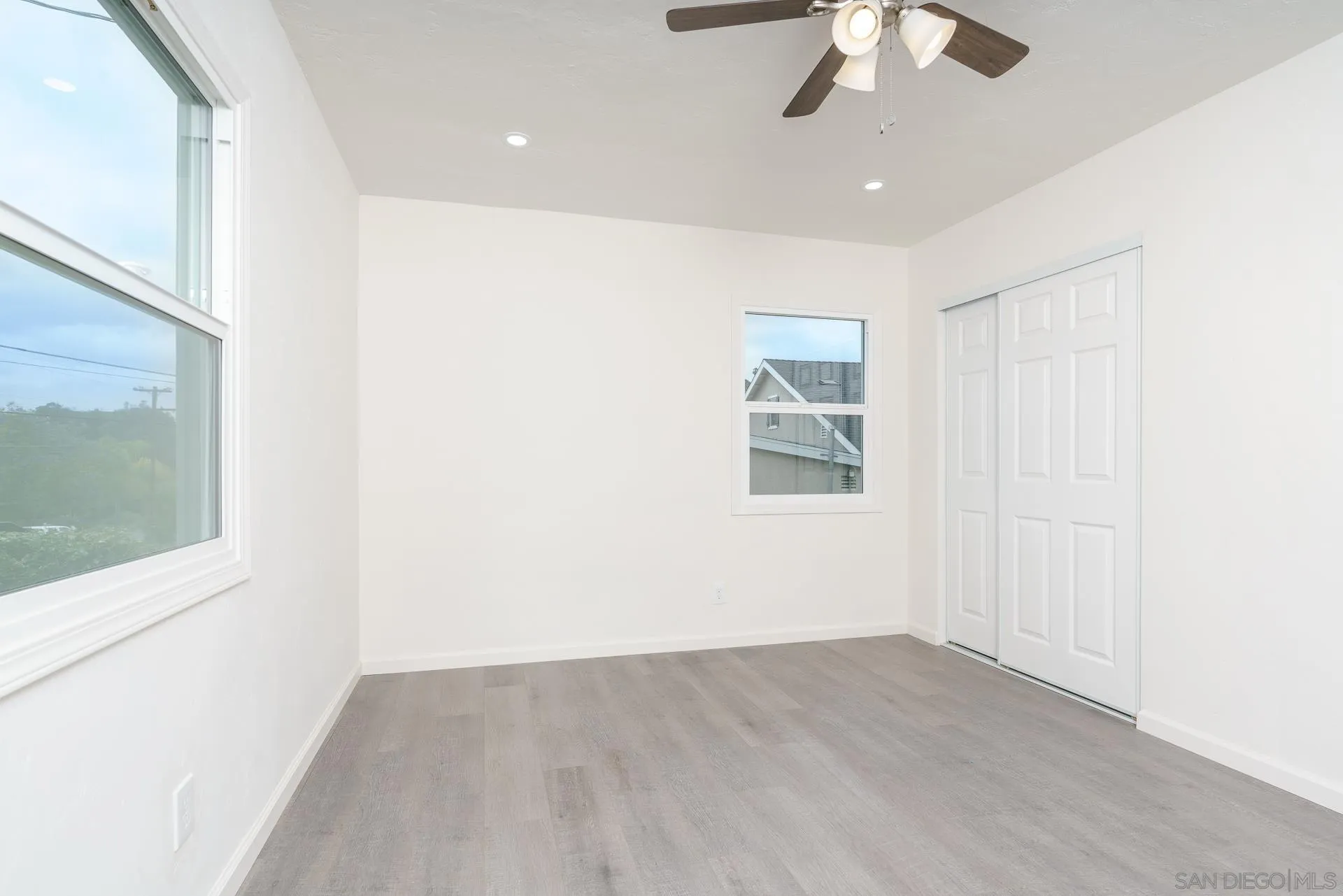 9208 Brookside Circle Spring Valley, CA 91977 - Photo 25 of 31 an empty room with windows and fan