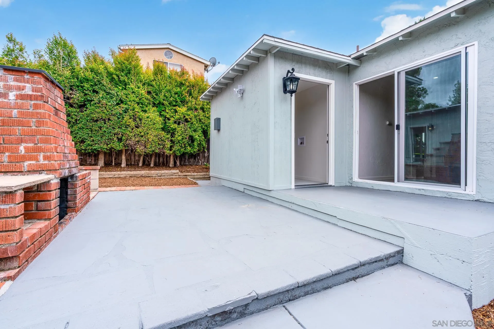 9208 Brookside Circle Spring Valley, CA 91977 - Photo 26 of 31 front view of a house with a yard