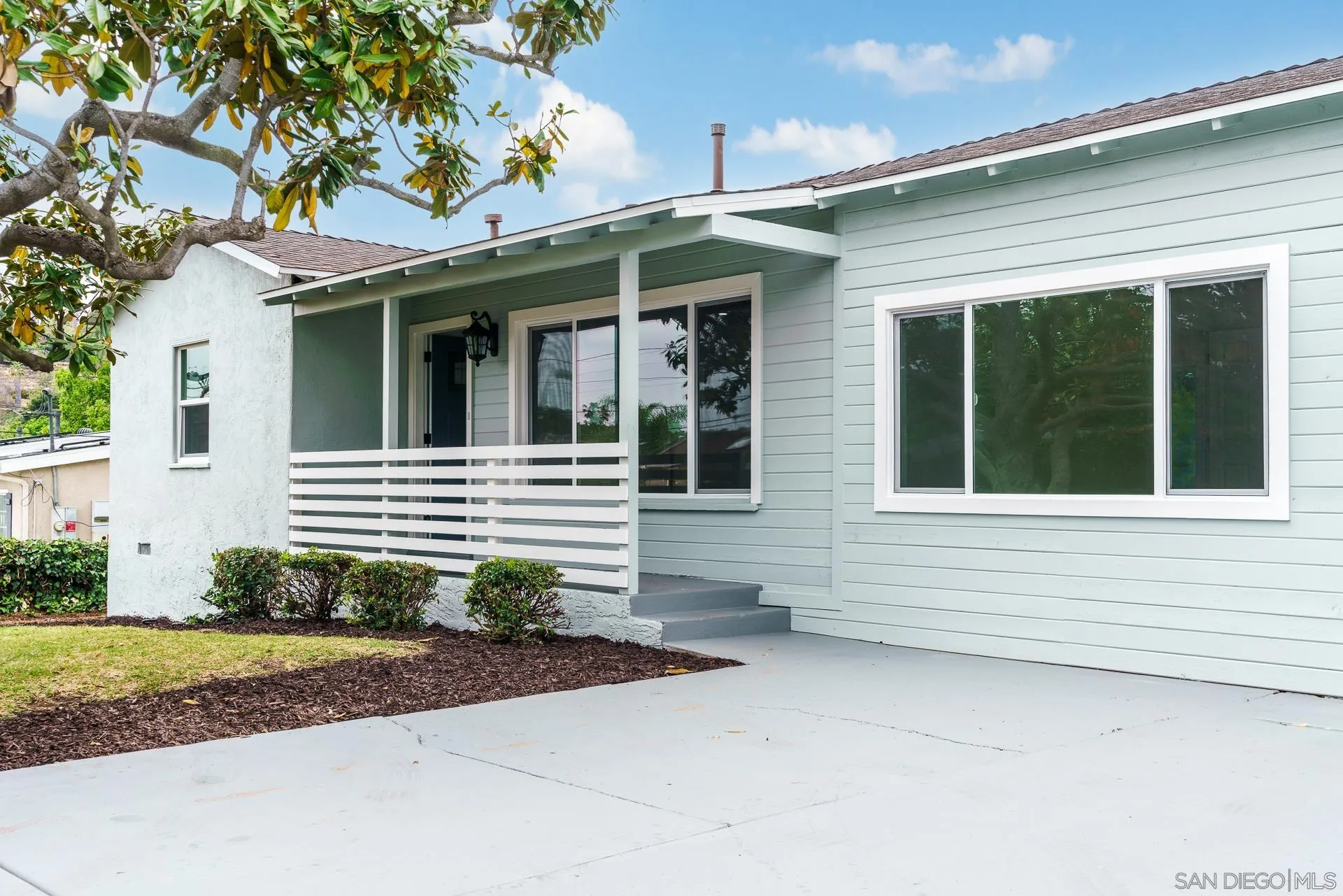 9208 Brookside Circle Spring Valley, CA 91977 - Photo 3 of 31 a view of a house and a yard