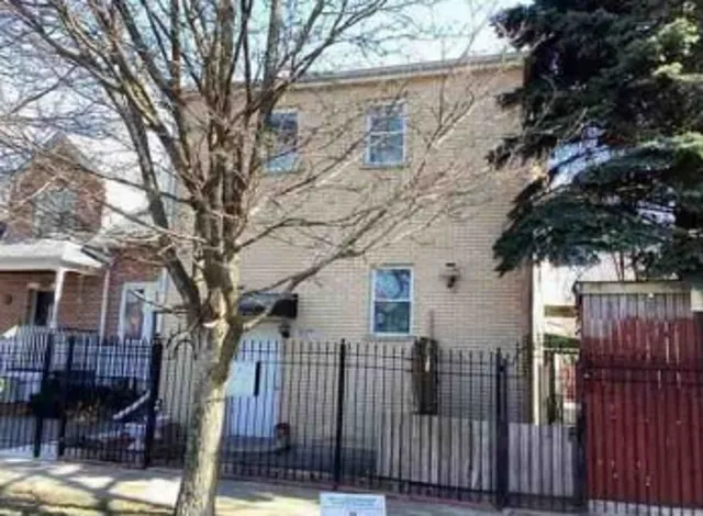 a view of a entrance gate of a house