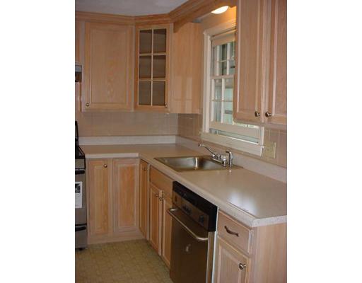87 Standish Road Needham, MA 02492 - Photo 8 of 9 a kitchen with a sink and cabinets