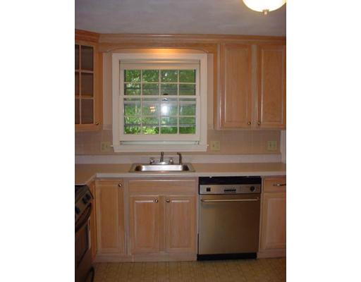 87 Standish Road Needham, MA 02492 - Photo 9 of 9 a view of a kitchen with a sink and dishwasher next to a window