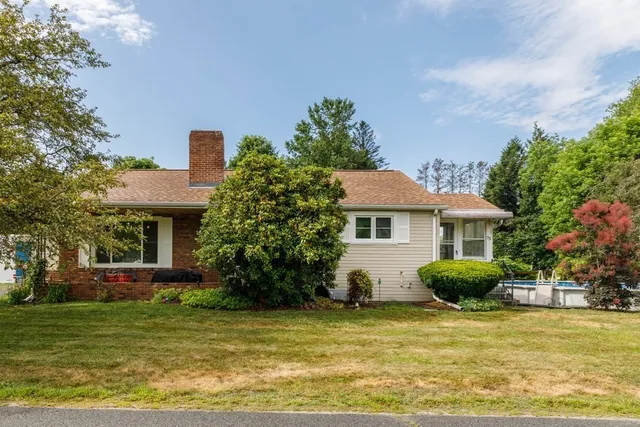a view of a house with a garden