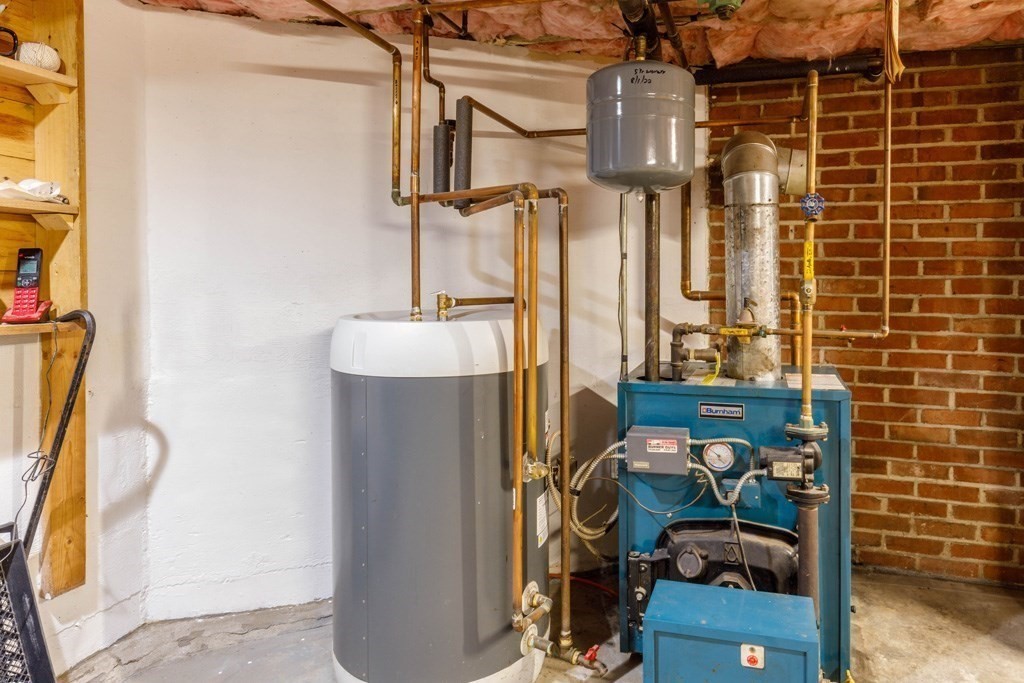 75 East Myrtle Street Orange, MA 01364 - Photo 13 of 28 a utility room with dryer and washer