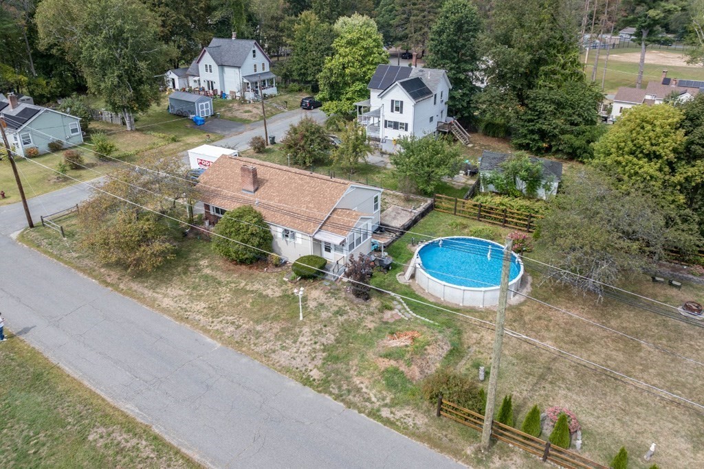75 East Myrtle Street Orange, MA 01364 - Photo 2 of 28 an aerial view of a house with outdoor space