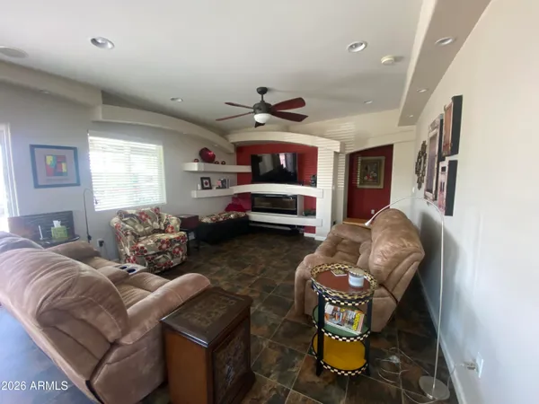 a view of a house with a fountain