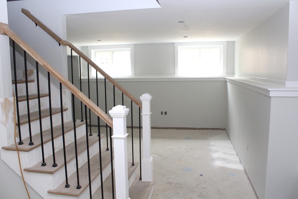 30 Mendon Street Upton, MA 01568 - Photo 9 of 26 a view of entryway and hall with wooden floor