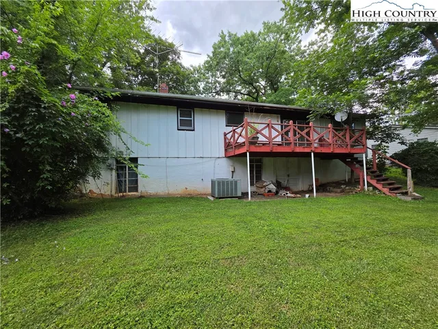 a view of a tree in a yard with a tree