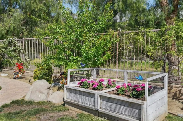 a view of a dinning table and chairs in patio