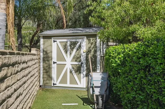 a utility room with sink dryer and washer