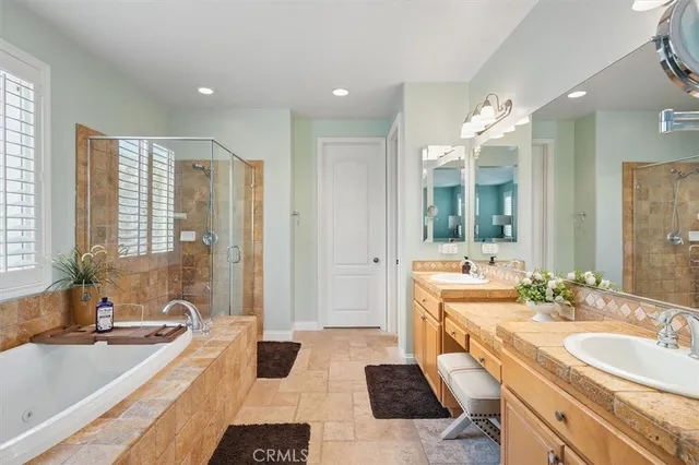 a view of a livingroom with workspace and a window