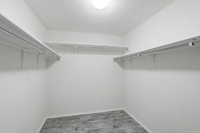 a view of a room with racks on the wall