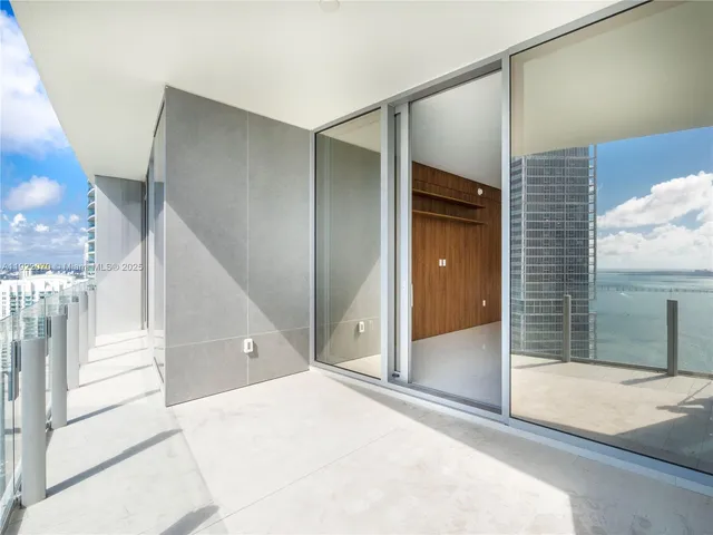 a view of a hallway view with staircase