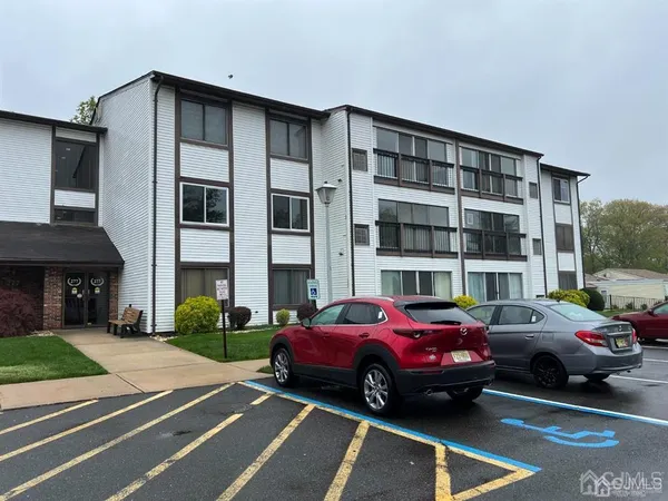 a cars parked in front of a building